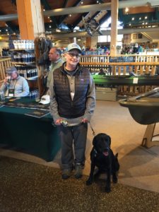 Capt. Avery and her dog Bigelow at the LL Bean Spring Fishing Expo
