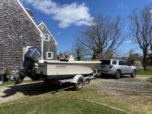 Boat on Trailer with Car