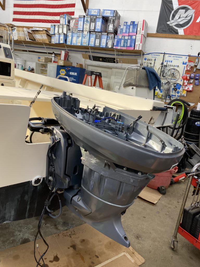 Outboard motor with out engine block or lower unit attached.